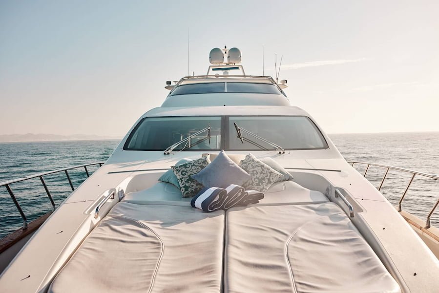 Sun decks and lounging aboard a luxury Cabo yacht charter